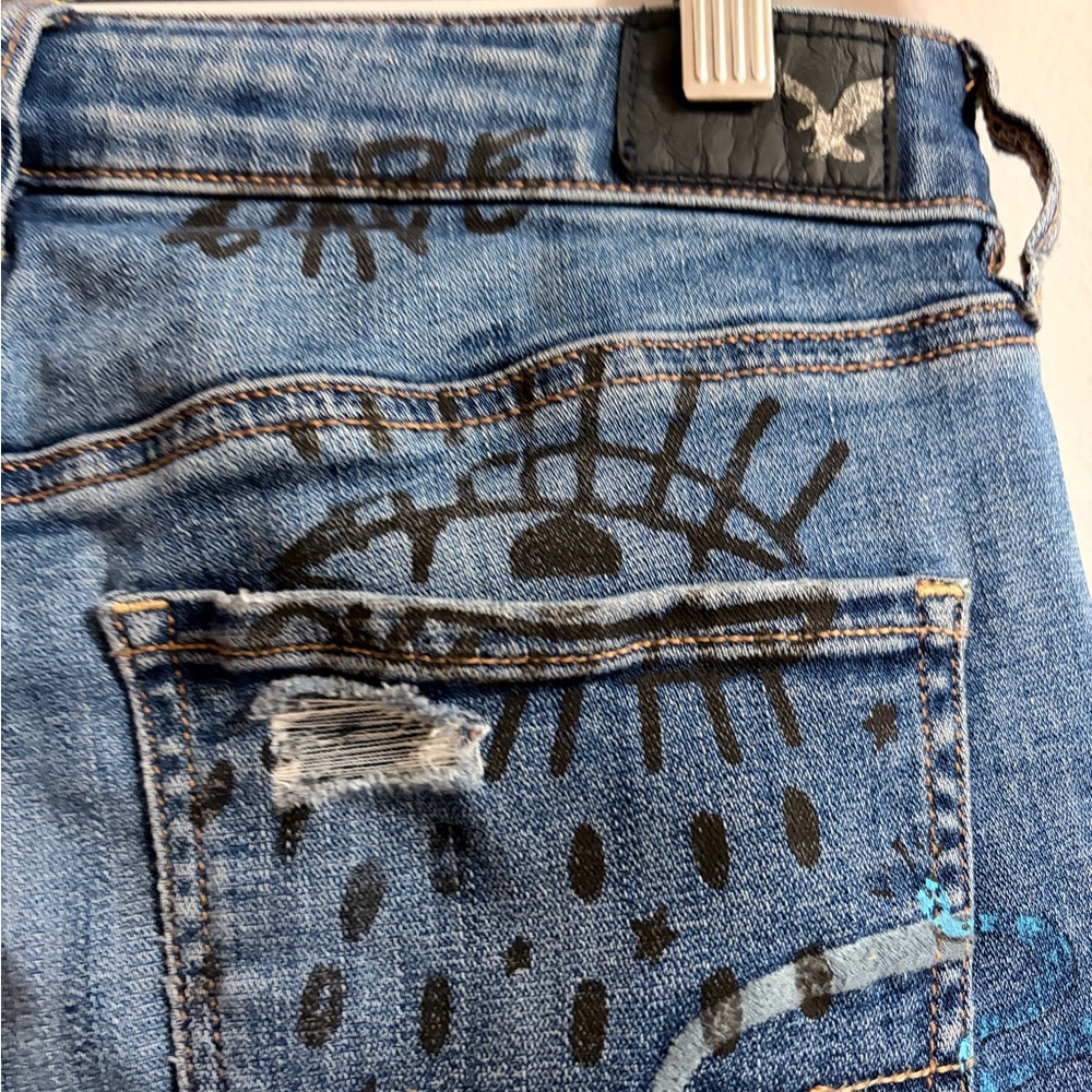 Distressed Blue Graphic Women’s Jeans with Patch & Embroidery - Picture 10 of 10